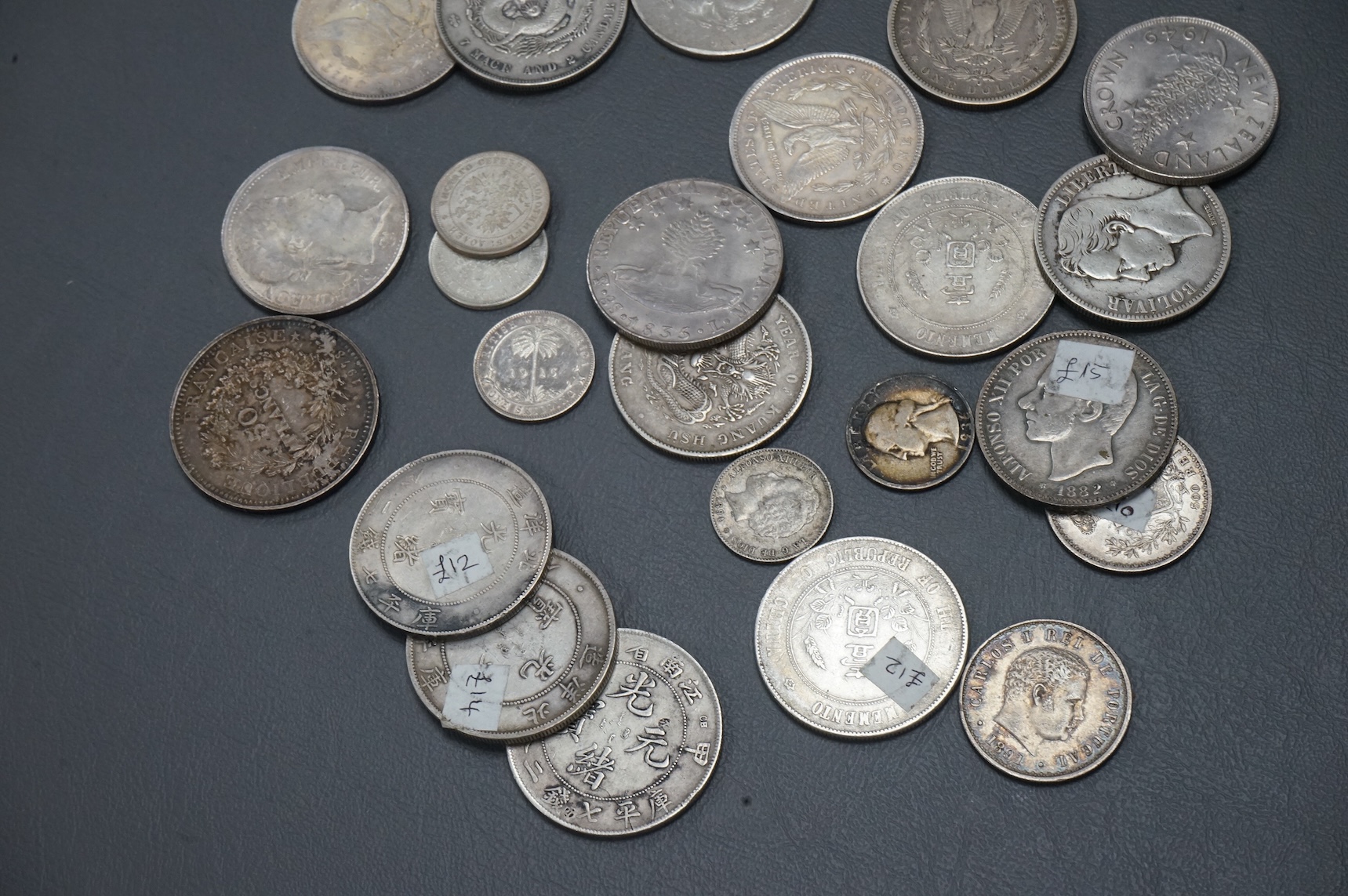 A collection of Chinese, France, Italy silver and coins and other world silver coins, late 19th/20th century